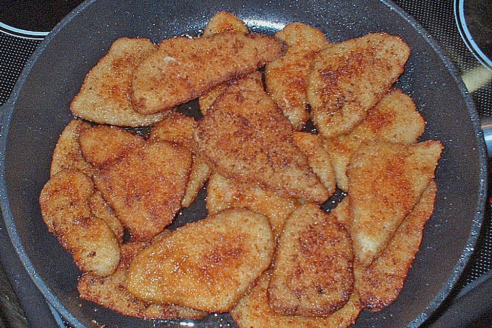 Gemüseplatte mit kleinen Schweineschnitzeln