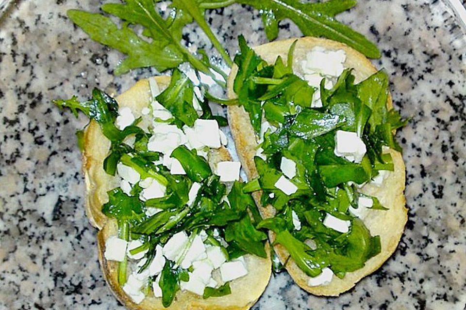 Bruschetta mit Rucola und Schafkäse