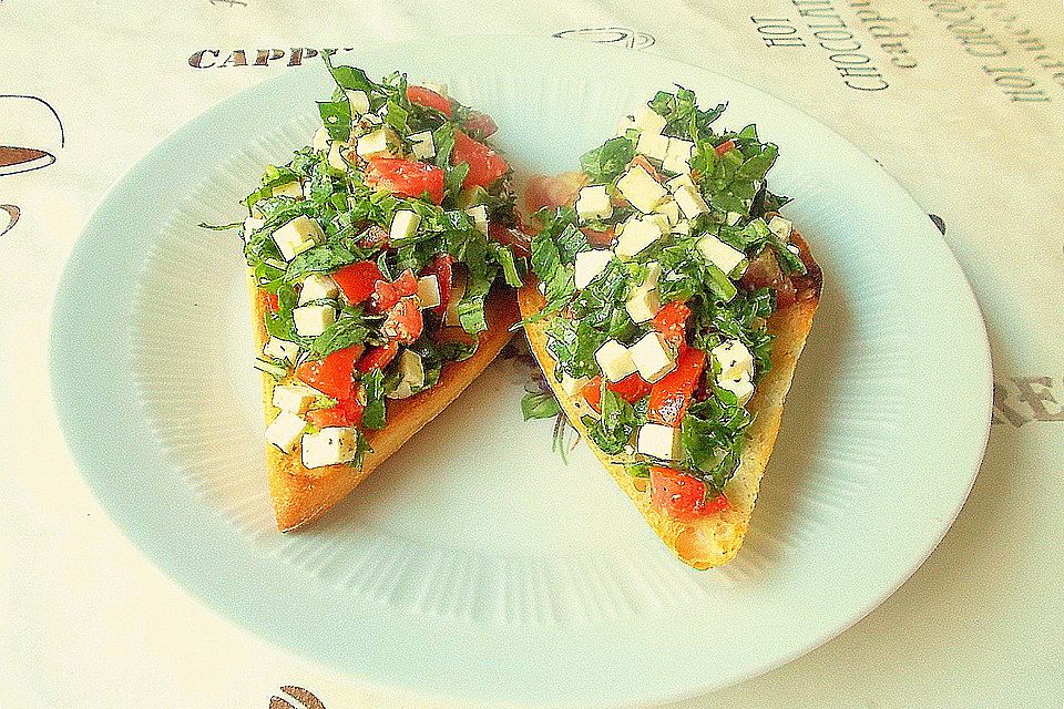 Bruschetta mit Rucola und Schafkäse