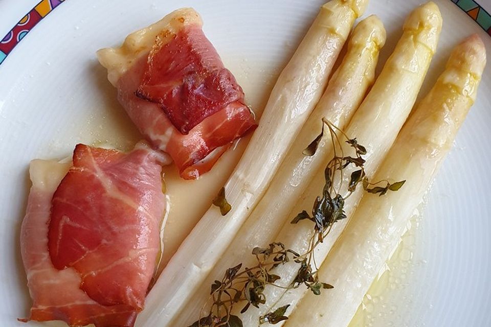 Spargel mit Mozzarella-Schinken-Päckchen