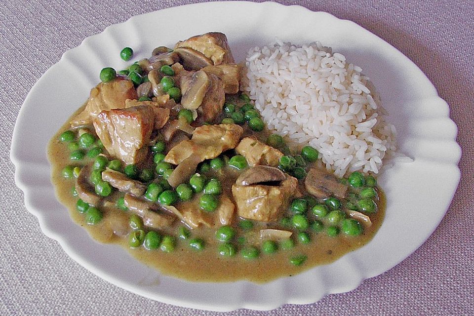 Puten - Curry mit Erbsen und Champignons