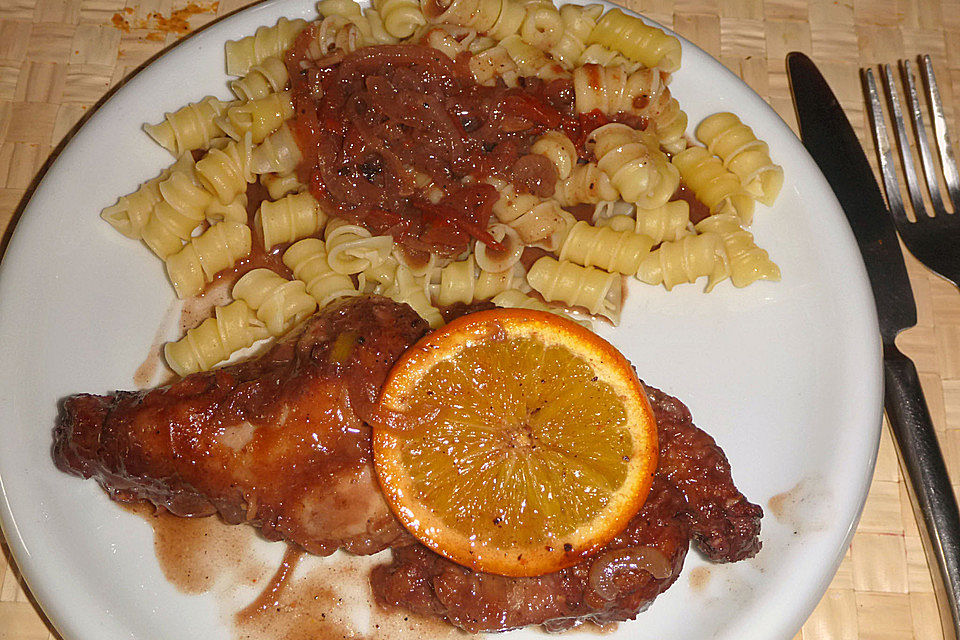 Portugiesisches Kaninchen mit Orangen