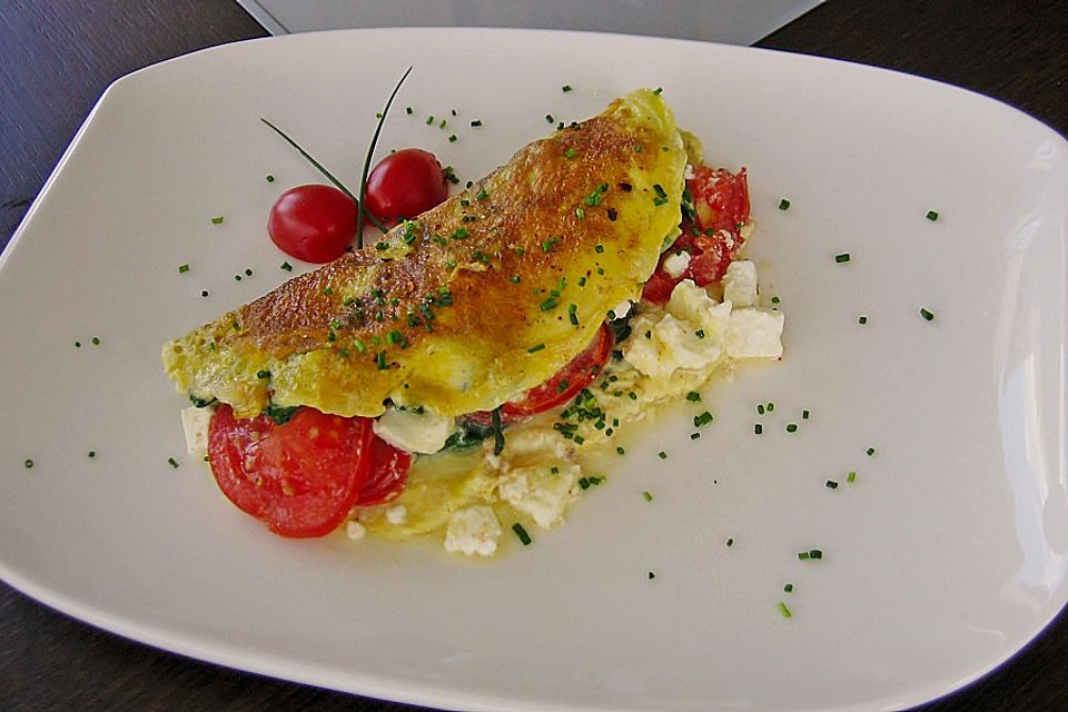 Omelette mit Blattspinat und Tomaten