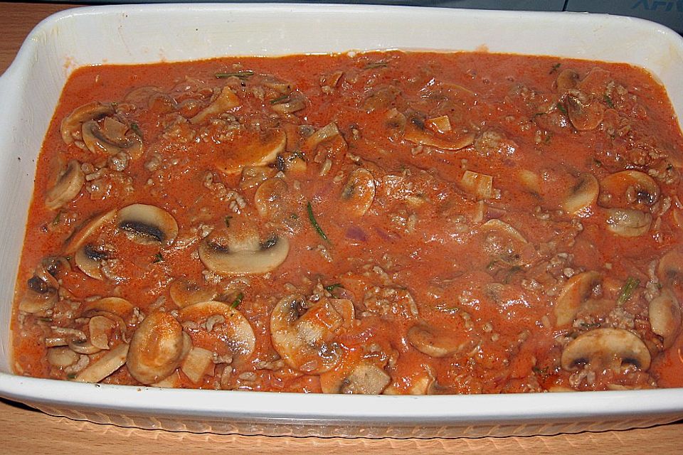 Bolognese - Schnitzel mit Pinienkernkruste