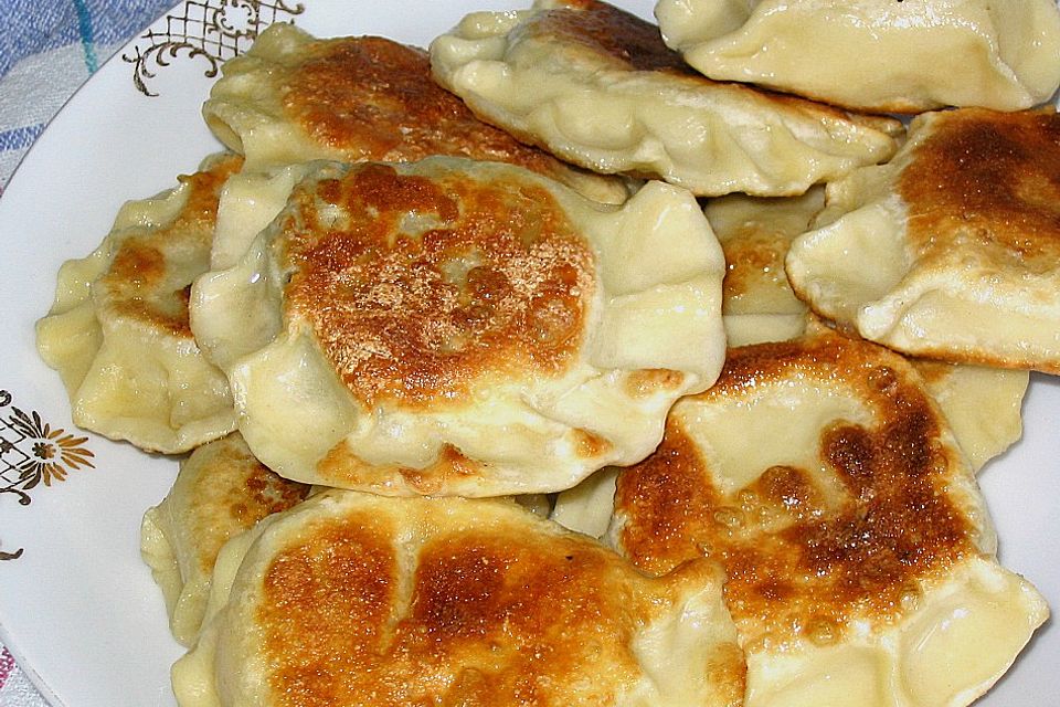 Piroggi mit Hackfleisch und Pilzen