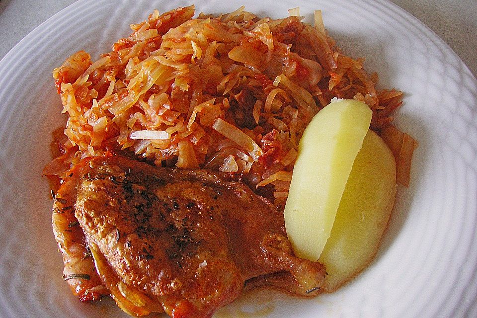 Kräuterhuhn auf Tomatenkraut