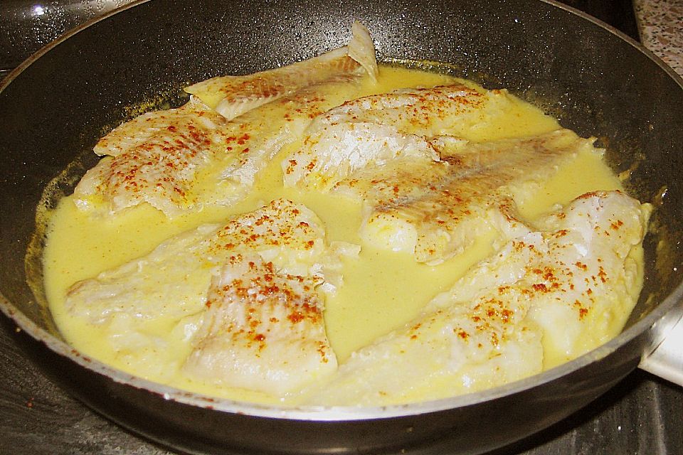 Fisch in Orangen - Sahne - Sauce