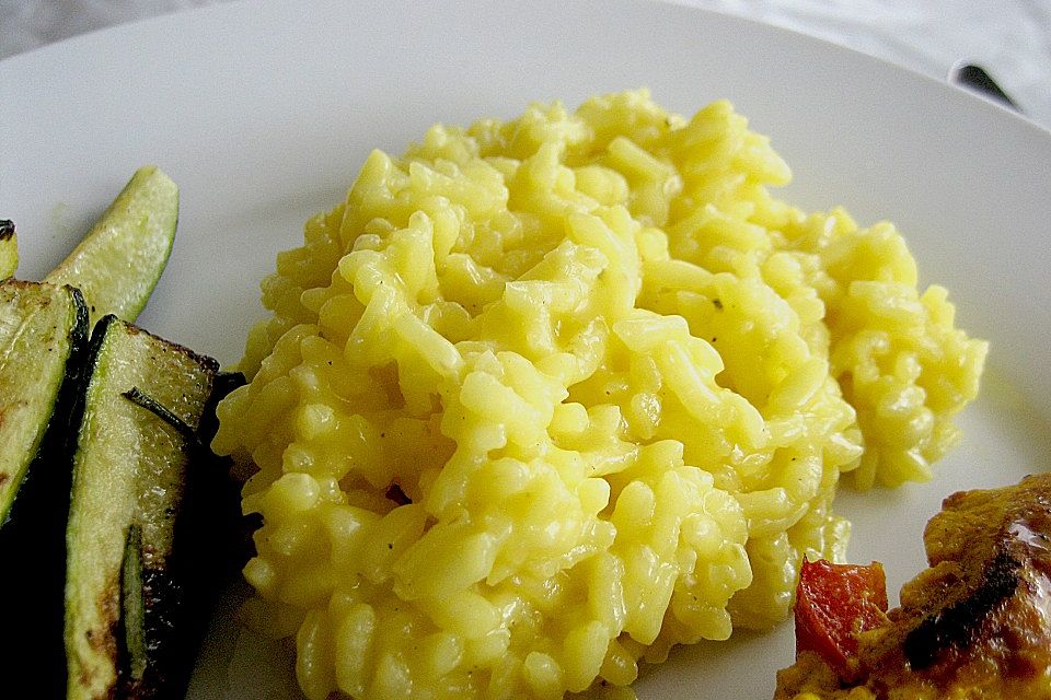 Safranrisotto mit Ofentomaten und glaciertem Zwiebellauch