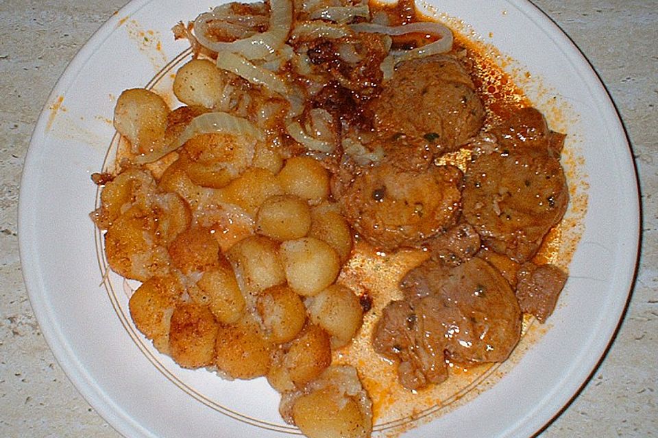 Schweinefilet in Pfeffersauce mit Röstzwiebeln