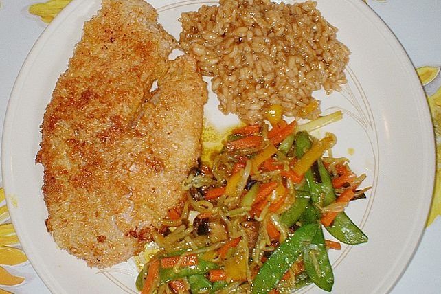 Buntbarsch im Kokosmantel mit Wokgemüse an Bratensaftrisotto von ...