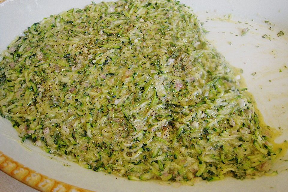 Schweinemedaillons auf gratinierten Zucchinistreifen