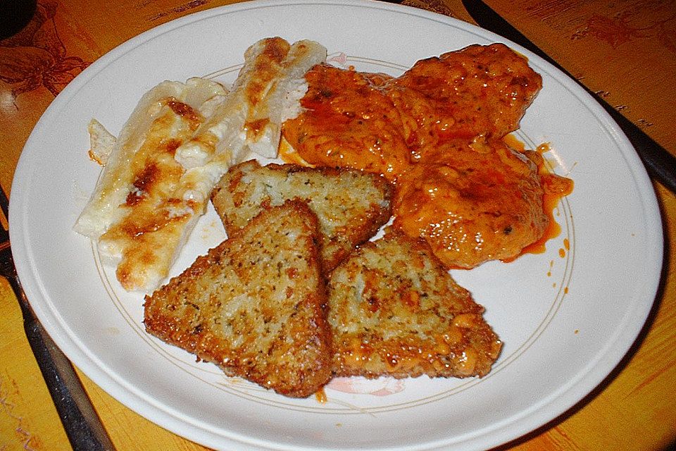 Schnitzelchen in Chili - Paprika - Sauce mit Spargel