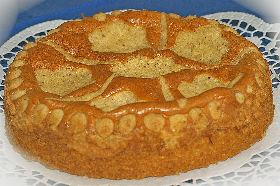 Kuchen mit gebackener Creme, Mandarinen und einem Hauch Kokos