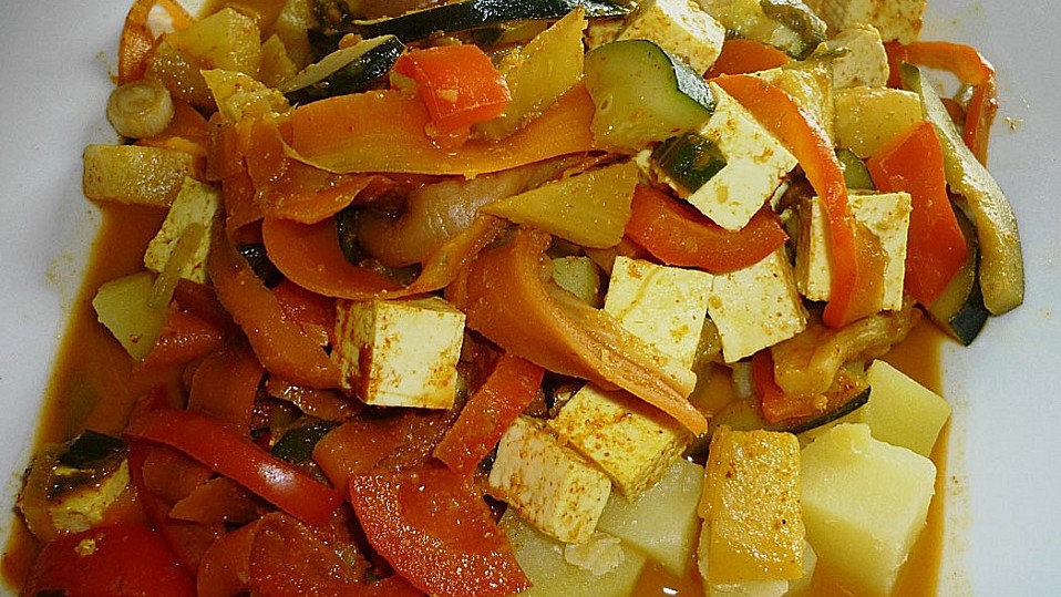 Bunte Gemüsepfanne mit Tofu auf Reis von Jujak Bunte Gemüsepfanne mit Tofu auf Reis von Jujak