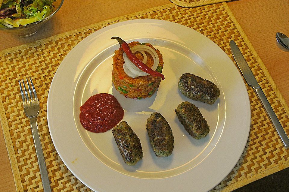 Djuvecreis mit Cevapcici