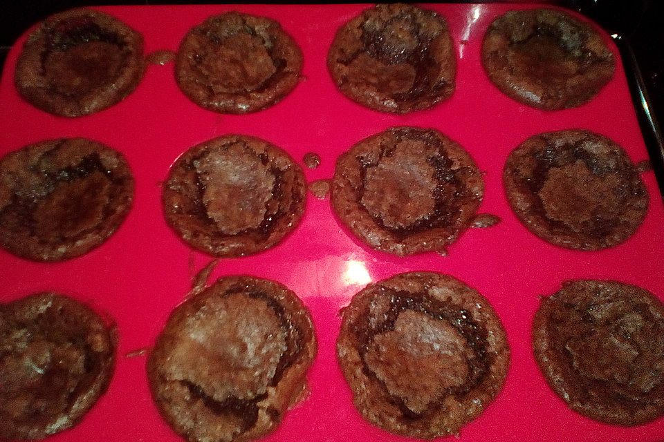 Schokomuffins mit heißem Schokokern Schokomuffins mit heißem Schokokern