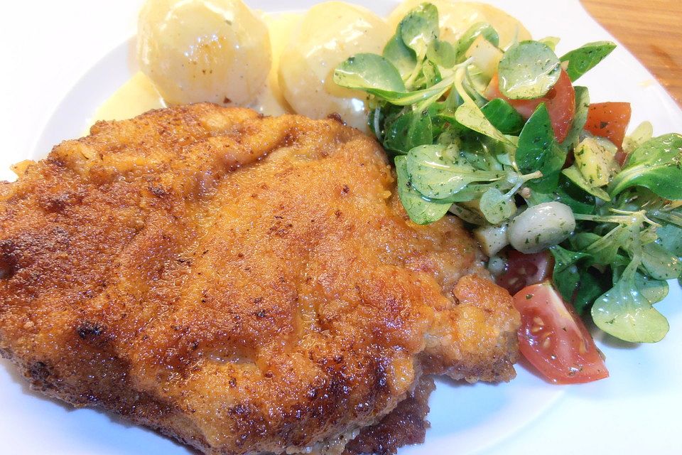 Schweinenackensteaks mit Käsekruste Schweinenackensteaks mit Käsekruste
